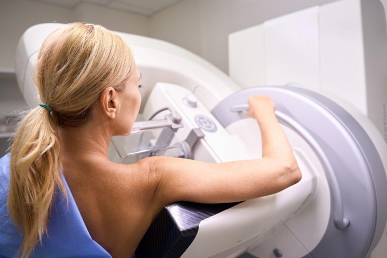 A woman undergoing a screening procedure for cheap mammograms at a local Houston medical diagnostic center.