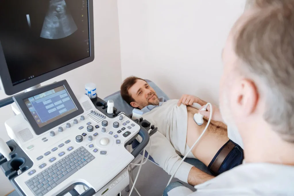 Male patient receives a cheap ultrasound Houston medical imaging center offers for budget friendly care.